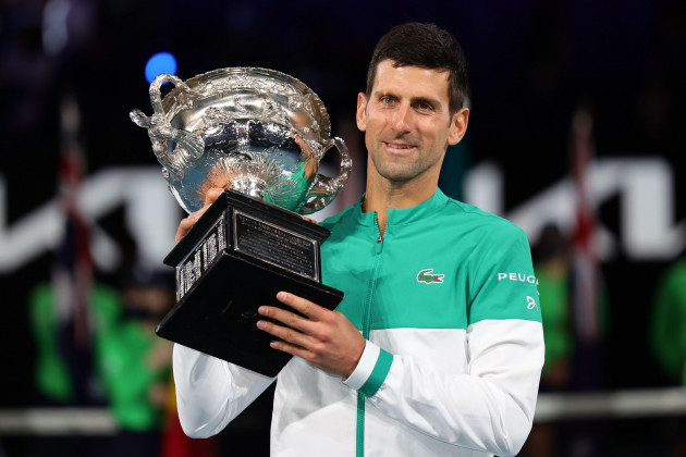 melbourne-australia-21st-feb-2021-1st-seed-novak-djokovic-of-serbia-poses-for-photographs-with-the-trophy-defeating-4th-seed-daniil-medvedev-of-the-russian-federation-in-the-mens-final-match-matc