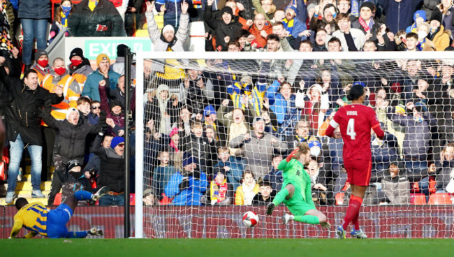 shrewsbury-towns-daniel-udoh-left-scores-their-sides-first-goal-of-the-game-during-the-emirates-fa-cup-third-round-match-at-anfield-liverpool-picture-date-sunday-january-9-2022