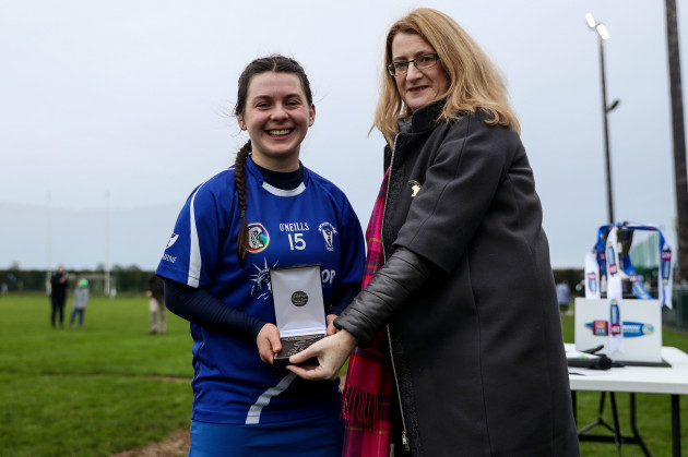 hannah-core-is-presented-with-the-player-of-the-match-award-by-hilda-breslin