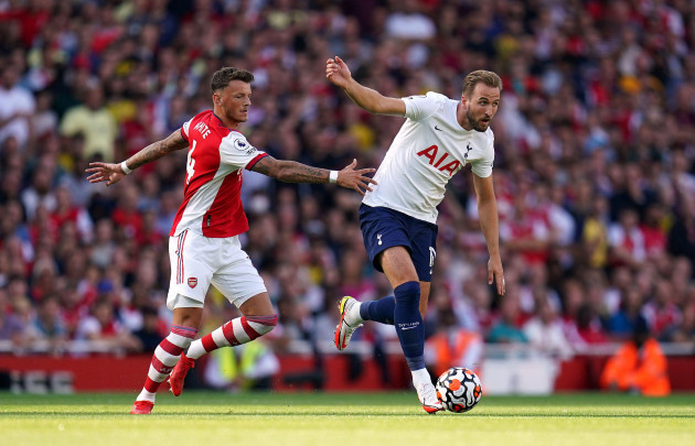 tottenham-hotspurs-harry-kane-right-and-arsenals-ben-white-battle-for-the-ball-during-the-premier-league-match-at-the-emirates-stadium-london-picture-date-sunday-september-26-2021