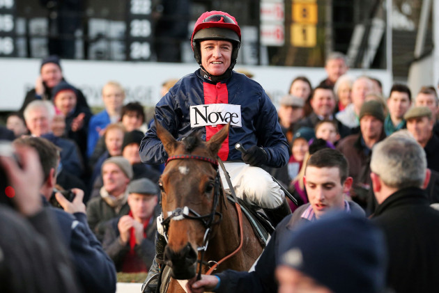 barry-geraghty-onboard-bobs-worth-is-led-into-the-parade-ring-after-winning-the-lexus-steeplechase