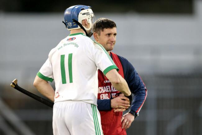 tj-reid-shakes-hands-with-kenneth-burke-after-the-game