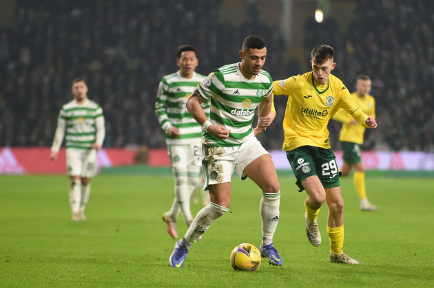 glasgow-scotland-17th-january-2022-giorgos-giakoumakis-of-celtic-and-steven-bradley-of-hibernian-during-the-scottish-premier-league-match-at-celtic-park-glasgow-picture-credit-should-read-neil