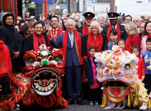 london-uk-1st-feb-2022-prince-charles-and-camilla-duchess-of-cornwall-don-red-scarves-as-they-visit-chinatown-to-celebrate-the-chinese-lunar-new-year-which-begins-on-february-1st-it-is-the-year
