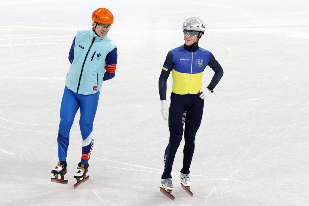 beijing-china-1st-feb-2022-short-track-speed-skaters-semyon-yelistratov-l-of-the-roc-team-and-oleg-gandei-of-ukraine-train-at-the-capital-indoor-stadium-ahead-of-the-2022-winter-olympic-games-sc
