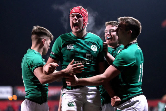 james-mcnabney-celebrates-scoring-a-try-with-teammates