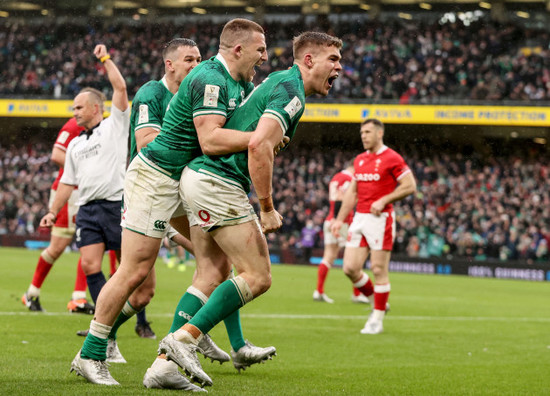 garry-ringrose-celebrates-scoring-their-fourth-try-with-andrew-conway-and-johnny-sexton