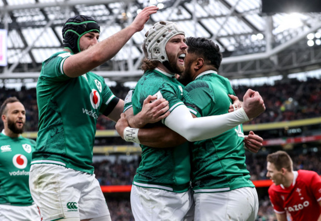 bundee-aki-celebrates-scoring-their-first-try-with-mack-hansen-and-caelan-doris