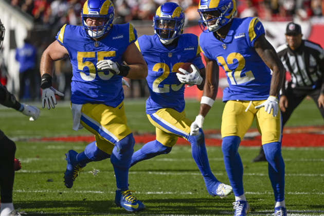 tampa-united-states-23rd-jan-2022-los-angeles-rams-cam-akers-23-runs-behind-blockers-brian-allen-55-and-van-jefferson-12-during-the-first-half-of-their-nfc-divisional-playoff-game-at-raymon