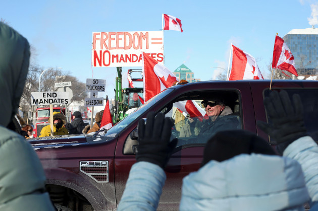transport-trucks-pick-ups-and-tractors-block-traffic-in-front-of-the-manitoba-legislative-building-as-truckers-and-their-supporters-continue-to-protest-coronavirus-disease-covid-19-vaccine-mandate