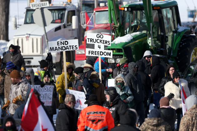 transport-trucks-pick-ups-and-tractors-block-traffic-in-front-of-the-manitoba-legislative-building-as-truckers-and-their-supporters-continue-to-protest-coronavirus-disease-covid-19-vaccine-mandate