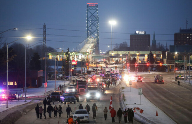 vehicles-block-the-route-leading-from-the-ambassador-bridge-linking-detroit-and-windsor-as-truckers-and-their-supporters-continue-to-protest-against-the-coronavirus-disease-covid-19-vaccine-mandat