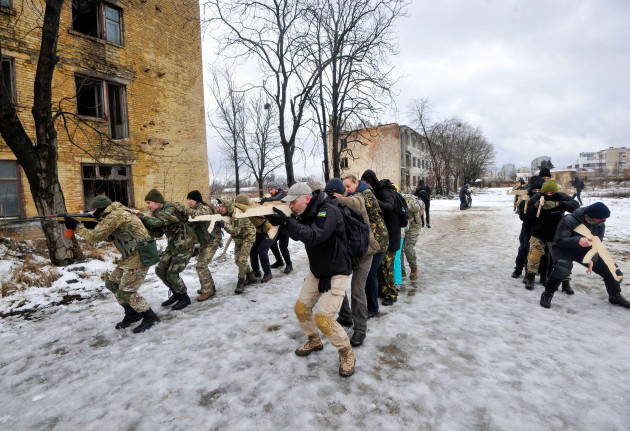 kyiv-ukraine-12th-feb-2022-ukrainians-attend-an-open-military-training-for-civilians-range-as-part-of-the-dont-panic-get-ready-which-is-carried-out-by-veterans-of-the-azov-battalion-on-a-tr