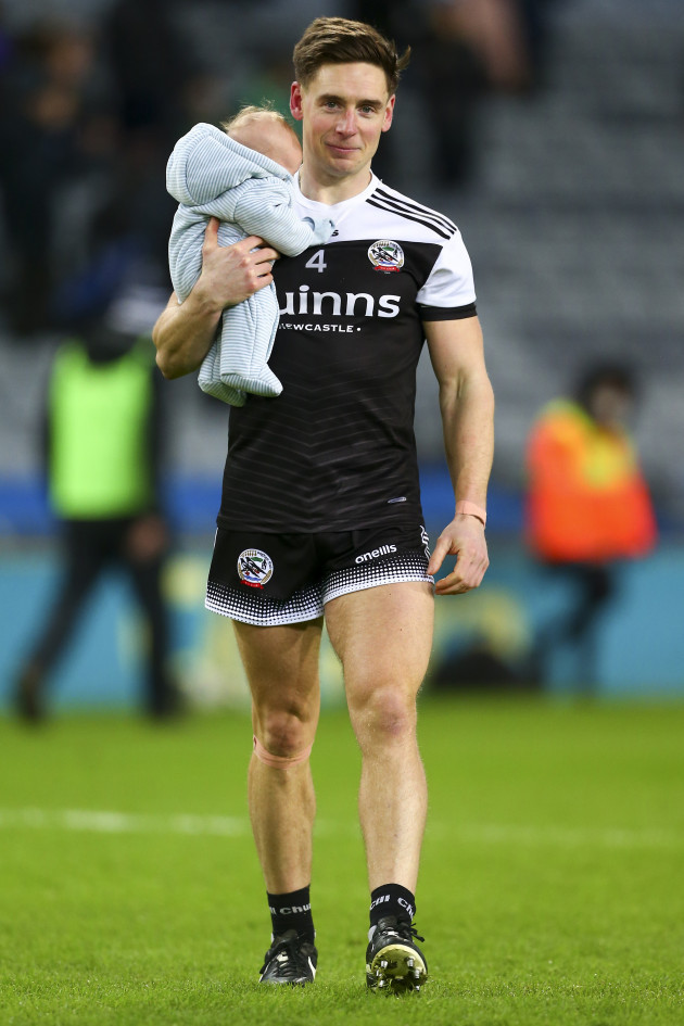aaron-branagan-with-his-6-week-old-son-leo-at-the-end-of-the-game