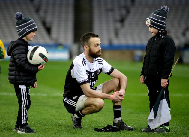 conor-laverty-with-his-sons-after-the-game