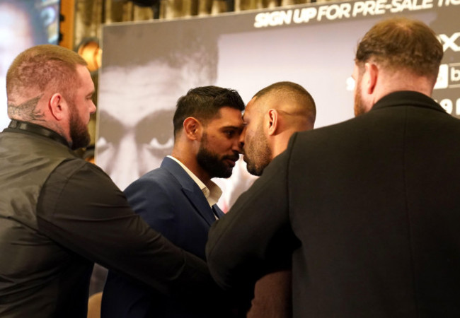 security-get-involved-as-amir-khan-left-and-kell-brook-confront-each-other-during-a-press-conference-at-the-london-hilton-london-domestic-rivals-amir-khan-and-kell-brook-will-finally-settle-their