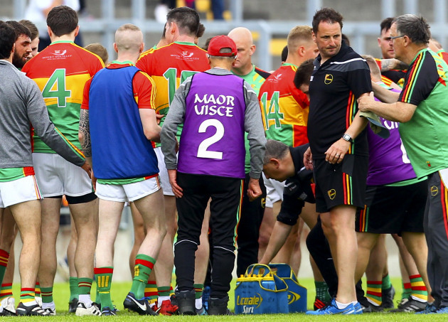 carlow-coach-steven-poacher-with-the-team-at-half-time