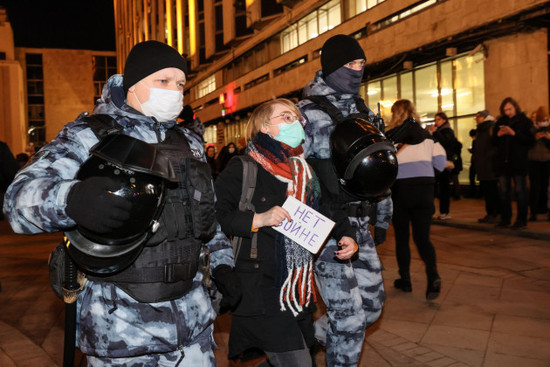 moscow-russia-24th-feb-2022-riot-police-detain-a-demonstrator-during-anti-war-protest-in-pushkin-square-in-central-moscow-early-on-24-february-russias-president-putin-announced-his-decision-to