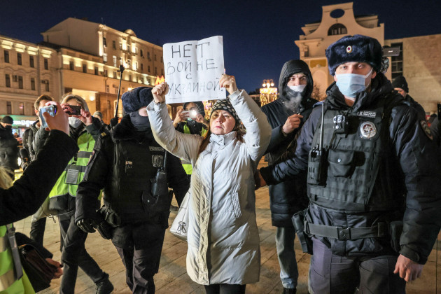 moscow-russia-february-24-2022-the-police-detain-a-demonstrator-who-is-holding-up-a-sign-with-a-message-reading-no-to-war-with-ukraine-during-an-unsanctioned-anti-war-protest-in-pushkin-square