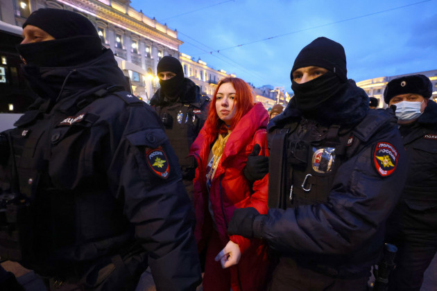 st-petersburg-russia-24th-feb-2022-the-police-detain-a-demonstrator-during-an-unsanctioned-anti-war-protest-in-central-st-petersburg-early-on-24-february-russias-president-putin-announced-his-d