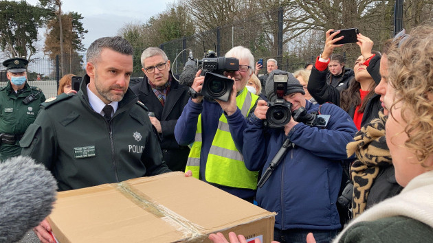 psni-assistant-chief-constable-bobby-singleton-receives-a-petition-from-fiona-donohoe-the-mother-of-noah-donohoe-a-14-year-old-pupil-at-st-malachys-college-in-belfast-was-found-dead-in-a-storm-drai