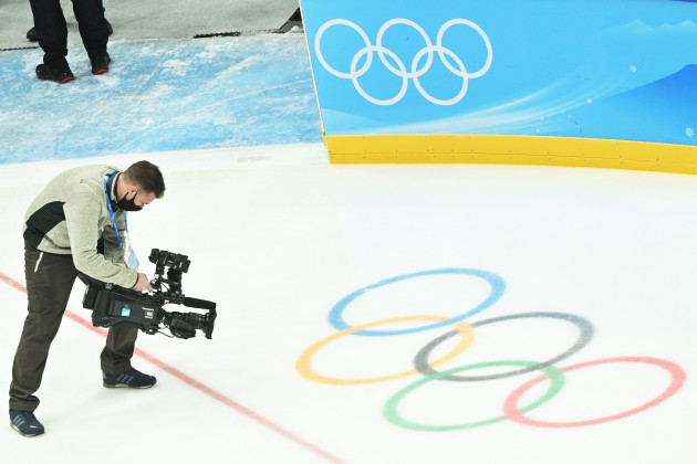 peking-china-31st-jan-2022-a-cameraman-films-the-olympic-rings-on-the-ice-surface-in-the-national-indoor-stadium-the-fan-olympic-ice-hockey-games-will-be-held-here-the-beijing-winter-olympics