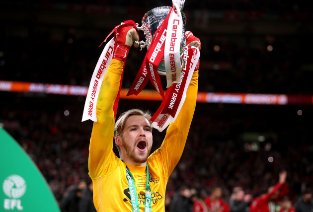 liverpool-goalkeeper-caoimhin-kelleher-celebrates-with-the-trophy-after-scoring-the-winning-penalty-of-the-carabao-cup-final-at-wembley-stadium-london-picture-date-sunday-27th-february-2022