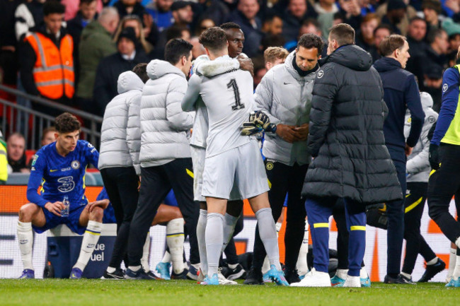 london-uk-27th-feb-2022-edouard-mendy-of-chelsea-hugs-kepa-arrizabalaga-of-chelsea-before-penalties-during-the-carabao-cup-final-match-between-chelsea-and-liverpool-at-wembley-stadium-on-february