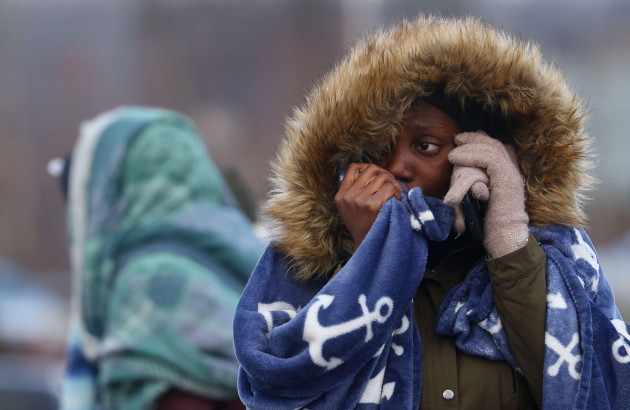 a-woman-from-western-africa-cries-while-taking-on-the-phone-after-fleeing-ukraine-following-the-russian-invasion-at-the-border-checkpoint-in-medyka-poland-february-28-2022-reuterskai-pfaffenba