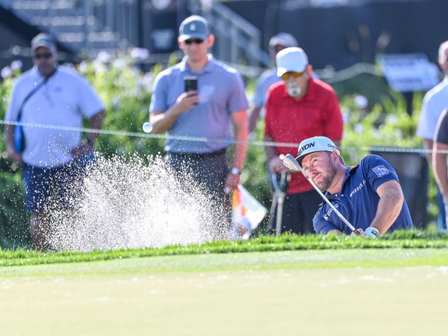 orlando-fl-usa-3rd-mar-2022-graeme-mcdowell-if-northern-ireland-hits-from-the-green-side-bunker-on-14-during-first-round-golf-action-of-the-arnold-palmer-invitational-presented-by-mastercard-held