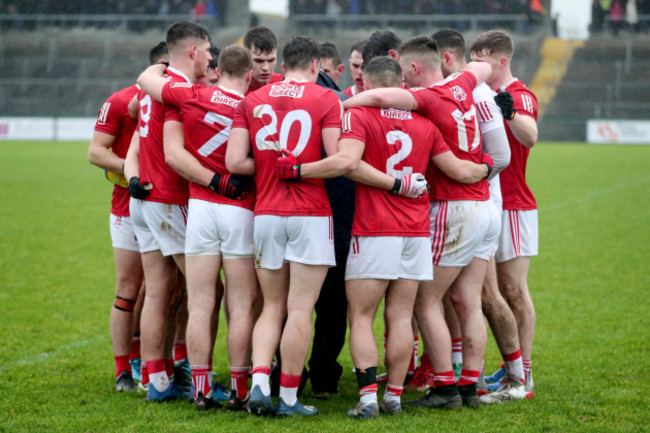 cork-team-huddle