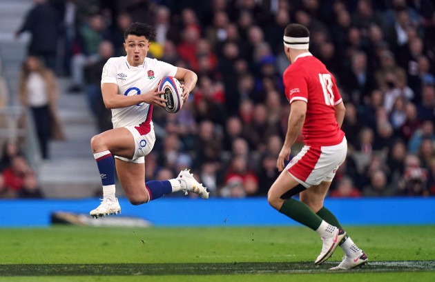 englands-marcus-smith-runs-past-wales-owen-watkin-during-the-guinness-six-nations-match-at-twickenham-stadium-london-picture-date-saturday-february-26-2022