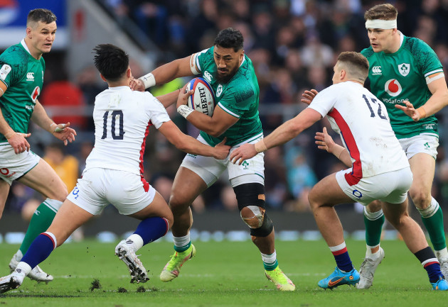irelands-bundee-aki-is-tackled-by-englands-marcus-smith-and-henry-slade