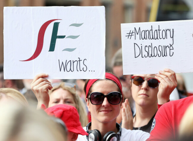 people-attend-a-demonstration-at-leinster-house-dublin-as-part-of-a-day-of-action-organised-by-standing-4-women-in-solidarity-with-the-women-affected-by-the-cervicalcheck-scandal