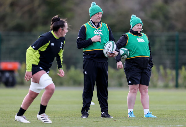 greg-mcwilliams-and-niamh-briggs-watch-on-during-training