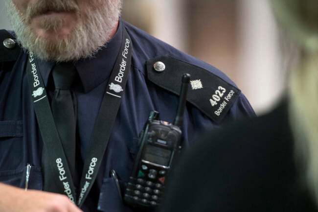 embargoed-to-1800-tuesday-september-12-a-uk-border-force-officer-watches-over-passengers-arriving-from-paris-on-the-eurostar-as-officers-from-the-metropolitan-police-service-british-transport-police