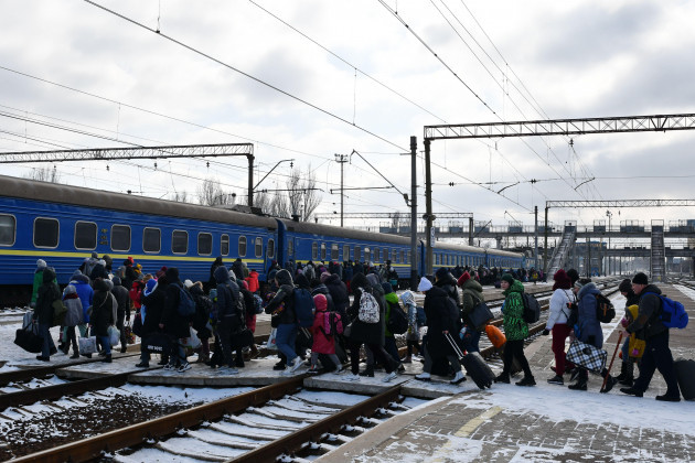 people-are-seen-getting-on-the-evacuation-train-at-the-railway-station-in-kramatorsk-the-flood-of-refugees-fleeing-war-after-russias-invasion-of-ukraine-grows-ever-larger-the-united-nations-refugee