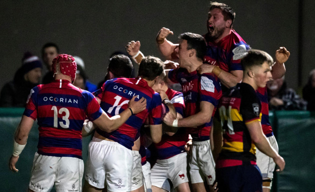 clontarf-players-celebrate-a-try-late-in-the-game