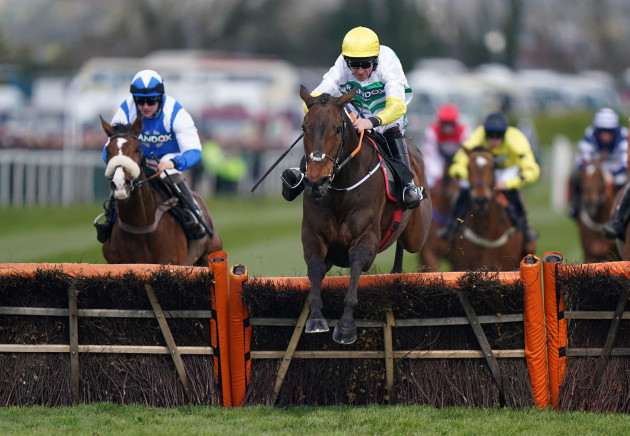 three-stripe-life-ridden-by-davy-russell-on-their-way-to-winning-the-betway-mersey-novices-hurdle-during-grand-national-day-of-the-randox-health-grand-national-festival-2022-at-aintree-racecourse-li