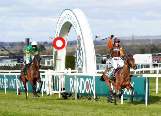 noble-yeats-ridden-by-jockey-sam-waley-cohen-right-wins-the-randox-grand-national-handicap-chase-during-grand-national-day-of-the-randox-health-grand-national-festival-2022-at-aintree-racecourse-li