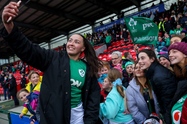 nichola-fryday-celebrates-after-the-game-with-fans-with-a-selfie
