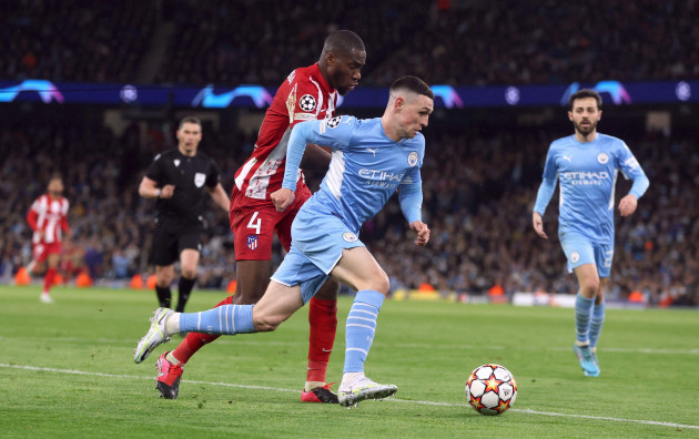 soccer-football-champions-league-quarter-final-first-leg-manchester-city-v-atletico-madrid-etihad-stadium-manchester-britain-april-5-2022-manchester-citys-phil-foden-in-action-with-atl