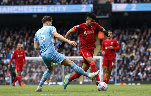 manchester-england-10th-april-2022-luis-diaz-of-liverpool-goes-past-john-stones-of-manchester-city-during-the-premier-league-match-at-the-etihad-stadium-manchester-picture-credit-should-read-d