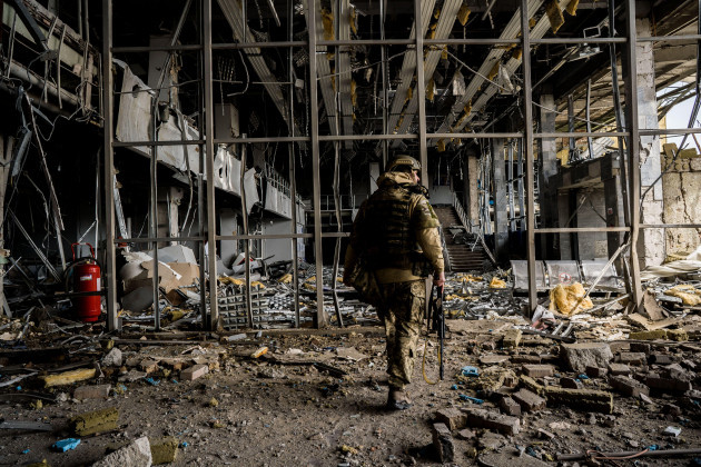 april-14-2022-mykolaiv-mykolaivs-oblast-ukraine-soldier-walking-in-the-rubble-of-the-international-airport-destroyed-by-the-bombing-in-mykolaiv-on-april-14-2022-credit-image-vincenzo