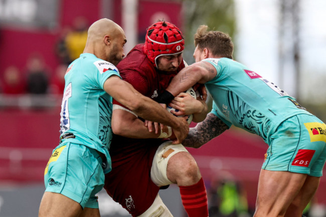 john-hodnett-is-tackled-by-olly-woodburn-and-stuart-hogg