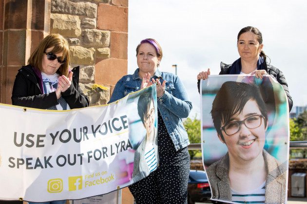 lyra-mckees-sisters-nichola-corner-left-and-joan-hunter-right-stand-with-ms-mckees-partner-sara-canning-centre-during-a-vigil-attended-by-members-of-the-national-union-of-journalists-nuj-at