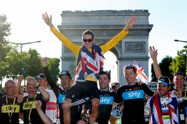sky-procycling-rider-and-leaders-yellow-jersey-bradley-wiggins-of-britain-wears-a-british-national-flag-as-he-celebrates-with-team-mates-his-overall-victory-in-front-the-arc-de-triomphe-in-paris-afte