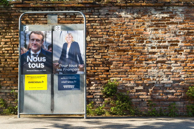 france-montauban-2022-04-14-emmanuel-macron-we-all-marine-le-pen-for-all-french-people-presidential-posters-on-their-electoral-boards-of-the-presidential-election-2022-second-round-official