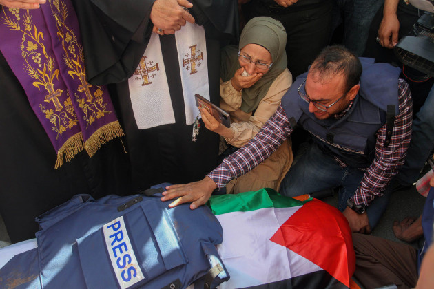may-12-2022-jenin-west-bank-palestine-editors-note-image-depicts-death-journalists-cry-next-to-the-body-of-palestinian-journalist-shireen-abu-aqleh-al-jazeera-correspondent-who-was-shot-de