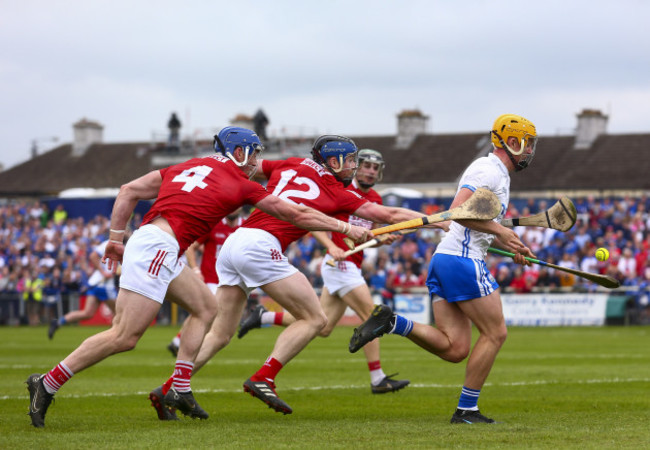 jack-prendergast-is-tackled-by-conor-lehane-and-sean-odonoghue